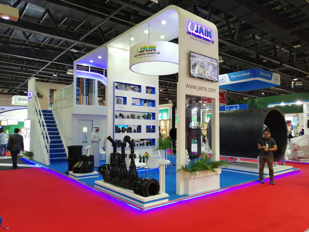 Setup process background showing exhibition stand construction